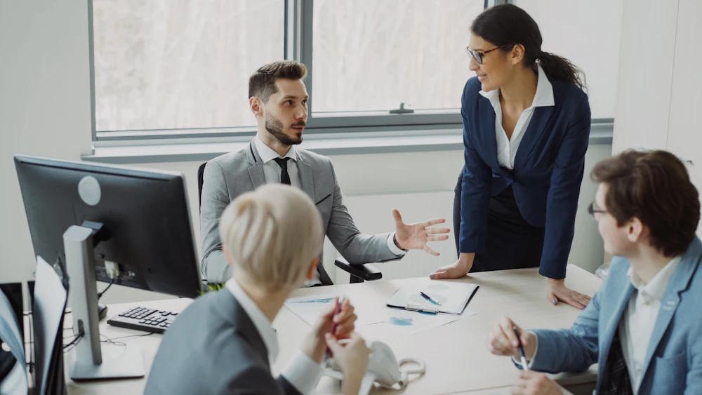 Business professionals collaborating during a working session